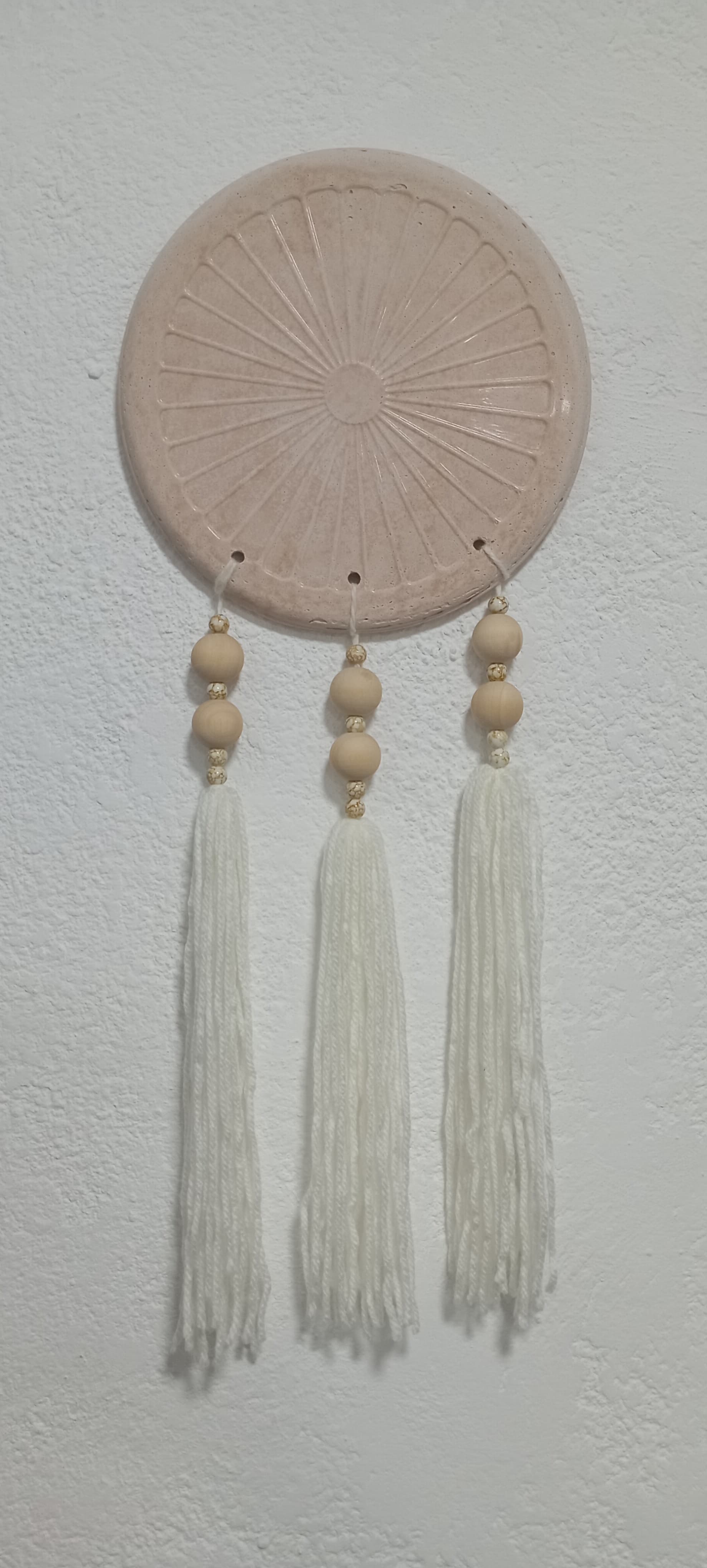 Colgante de cemento y borlas