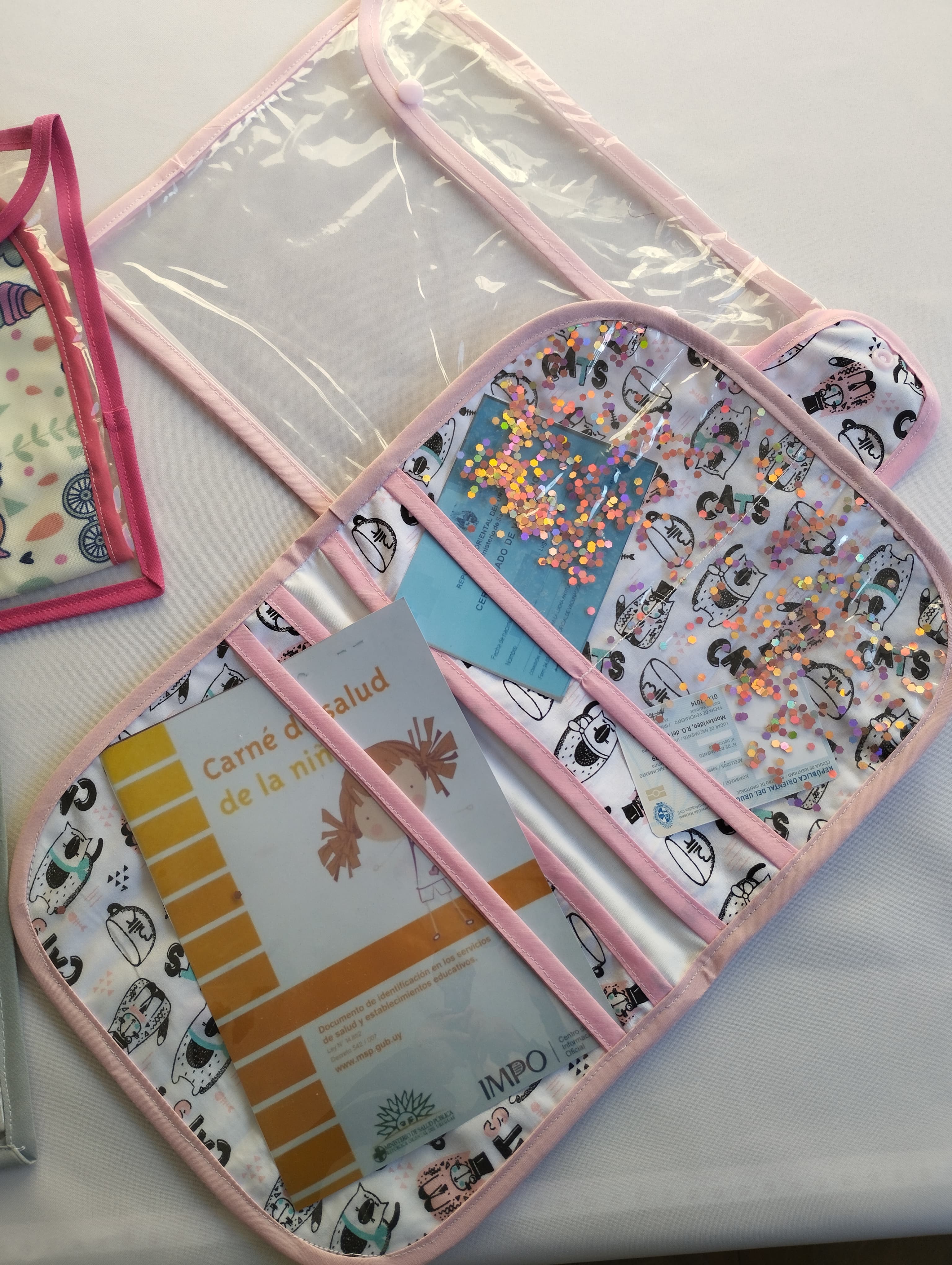 Porta documento pediátrico