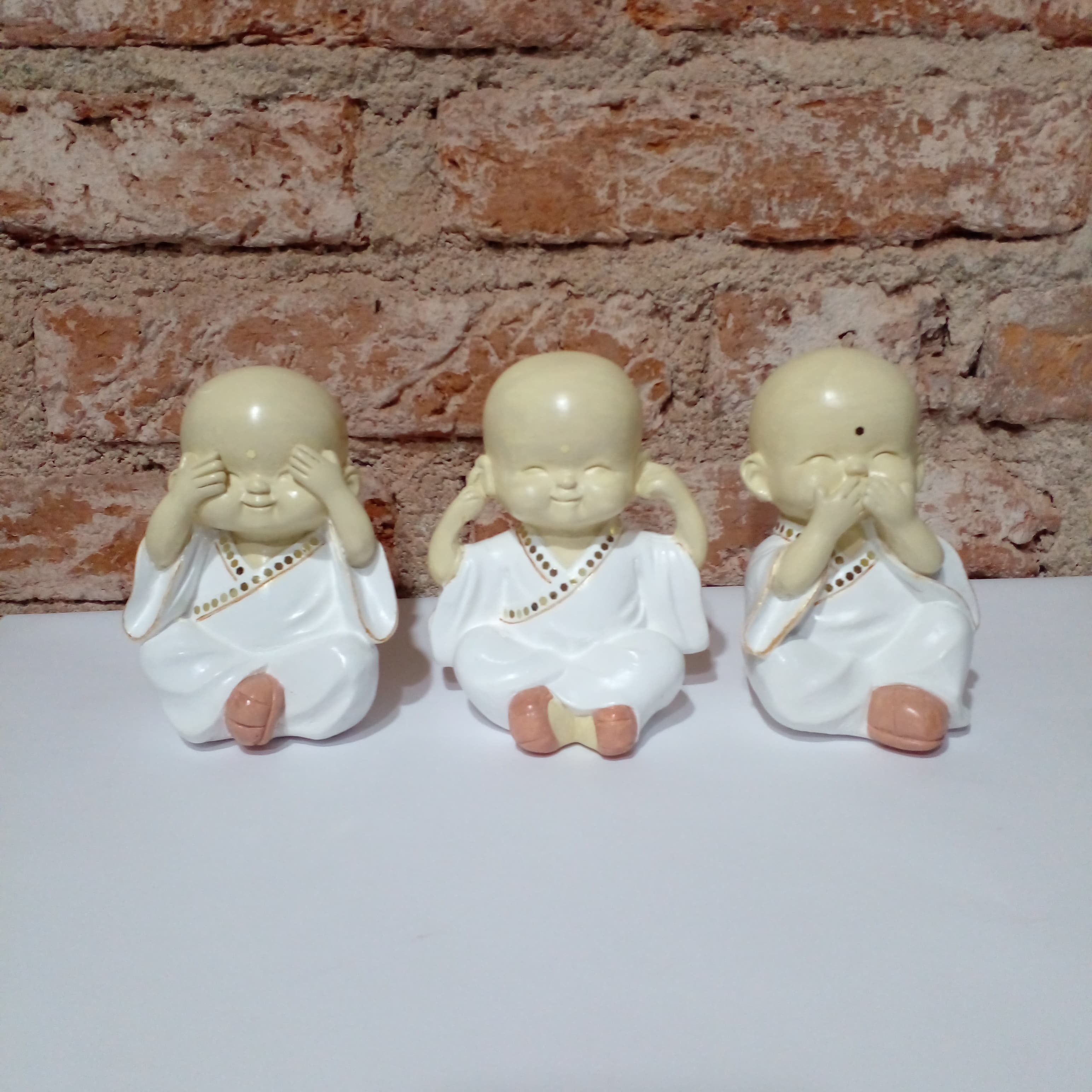 Trío de Budas sabios